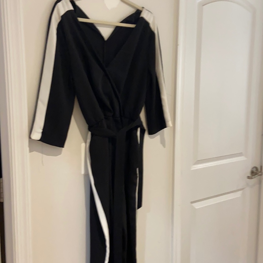 Zara black jump suit with white side stripe